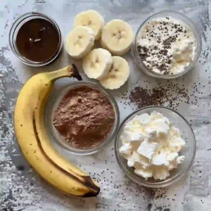 Ingredients for cottage cheese chocolate mousse arranged on a countertop